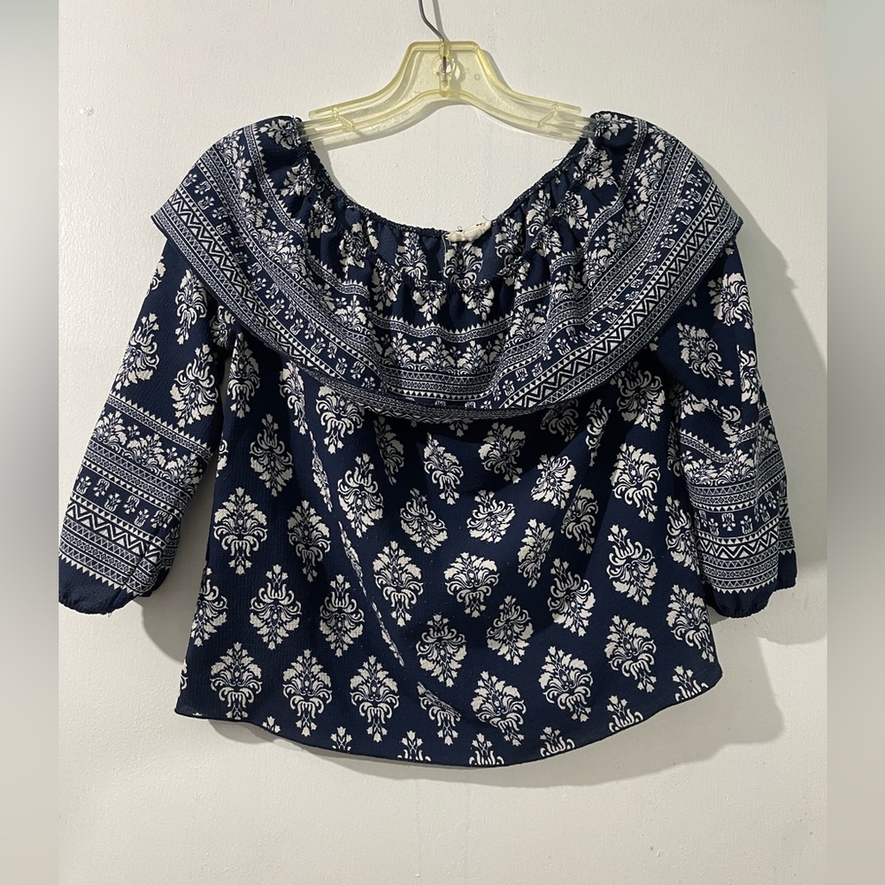 Blue and white blouse.